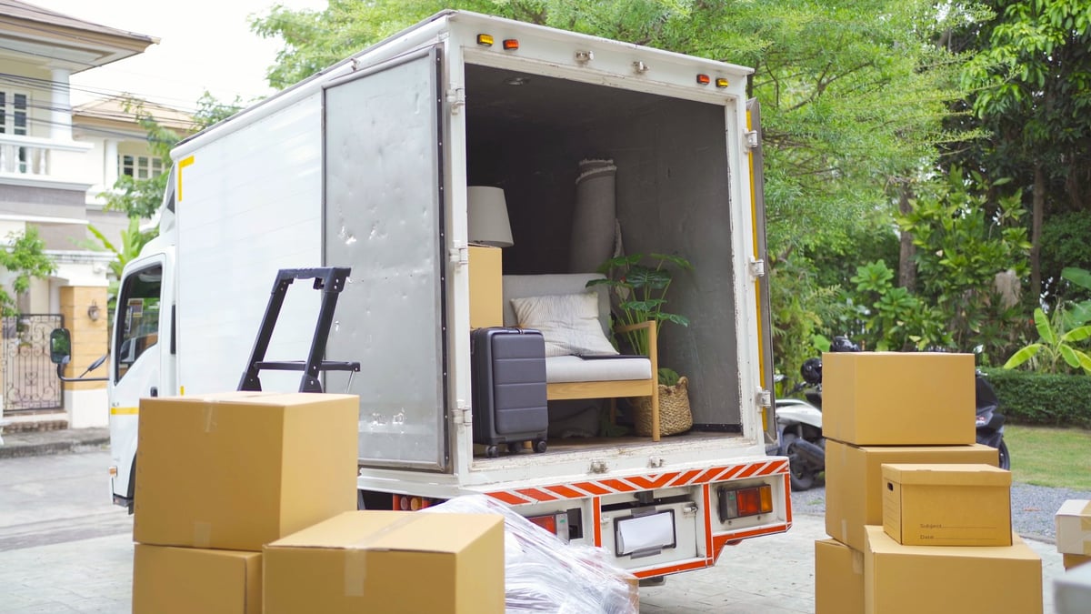 Moving truck delivering boxes and furniture to customers